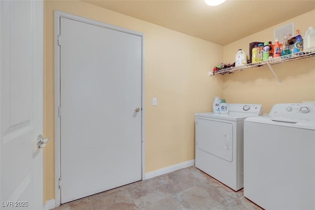 10001 Peace Way Unit 1250, Las Vegas, NV 89147 - washroom featuring washer and clothes dryer and baseboards