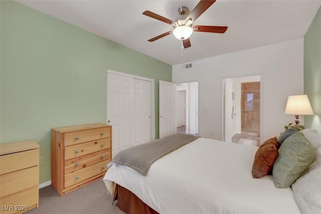 10001 Peace Way Unit 1250, Las Vegas, NV 89147 - bedroom with a closet, ensuite bath, a ceiling fan, baseboards, and light colored carpet