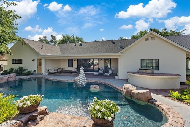 204 Canyon Dr, Las Vegas, NV 89107 - outdoor pool featuring a patio and an outdoor living space