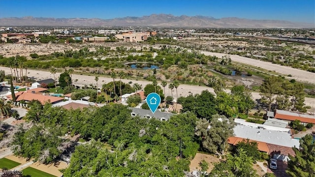 204 Canyon Dr, Las Vegas, NV 89107 - aerial overview of property's location featuring mountains and nearby suburban area