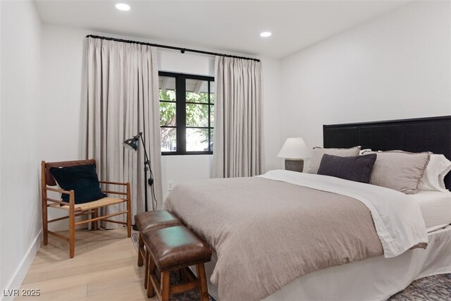 204 Canyon Dr, Las Vegas, NV 89107 - bedroom featuring light wood-type flooring, recessed lighting, and baseboards