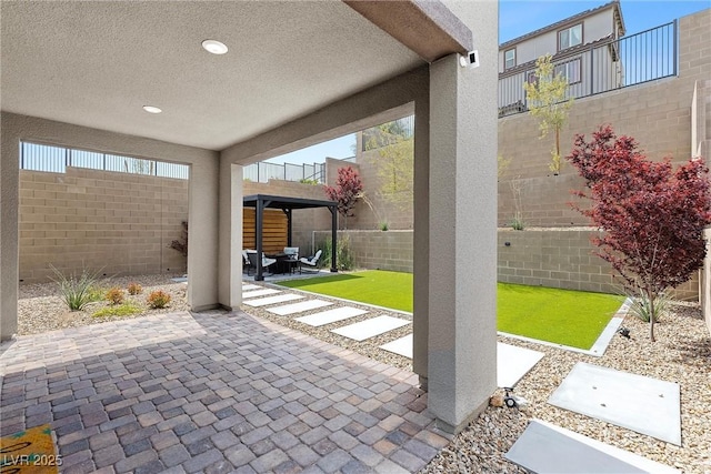 2367 Ridgeline Wash St, Las Vegas, NV 89138 - fenced backyard with a patio