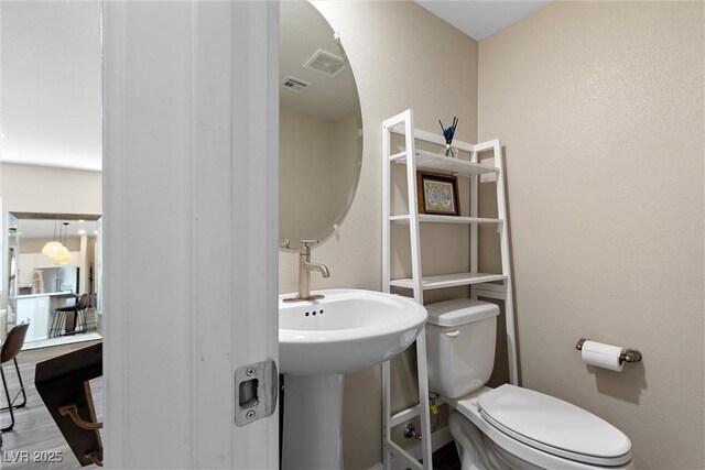 2367 Ridgeline Wash St, Las Vegas, NV 89138 - half bathroom with toilet