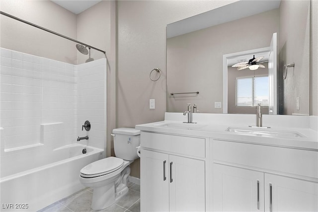 2367 Ridgeline Wash St, Las Vegas, NV 89138 - bathroom featuring toilet, double vanity, washtub / shower combination, tile patterned floors, and baseboards