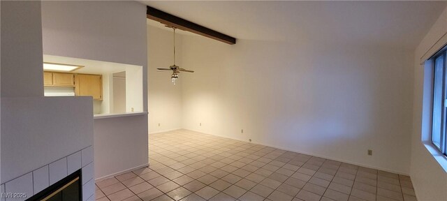 2216 Short Pine Dr, Las Vegas, NV 89108 - unfurnished living room featuring beamed ceiling, a ceiling fan, light tile patterned flooring, high vaulted ceiling, and baseboards