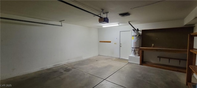 2216 Short Pine Dr, Las Vegas, NV 89108 - garage featuring water heater and a garage door opener