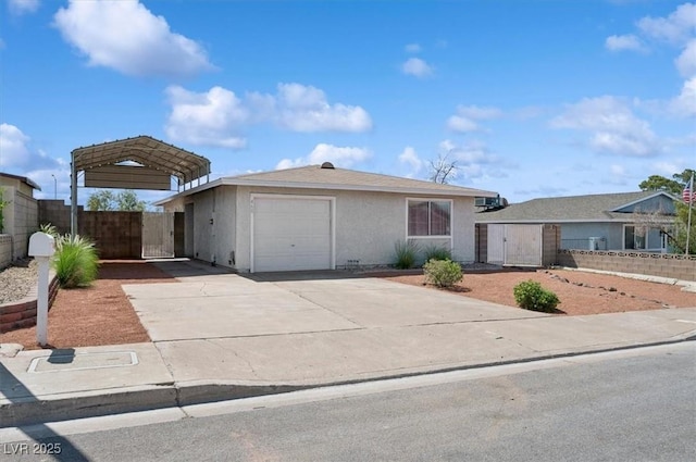 460 Crestway Rd, Henderson, NV 89015 - ranch-style house featuring concrete driveway, stucco siding, an attached garage, a detached carport, and a gate