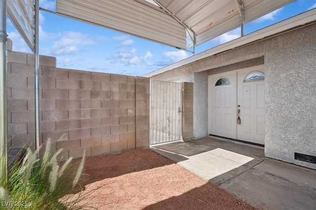460 Crestway Rd, Henderson, NV 89015 - doorway to property featuring a gate and stucco siding