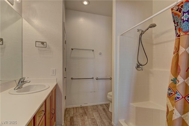 2304 Willow Wren Dr, North Las Vegas, NV 89084 - bathroom with vanity, wood finished floors, a shower with curtain, toilet, and recessed lighting