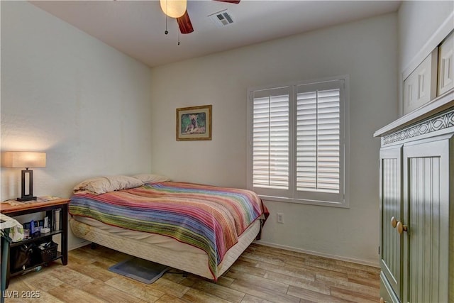 2304 Willow Wren Dr, North Las Vegas, NV 89084 - bedroom featuring wood finished floors, ceiling fan, and baseboards