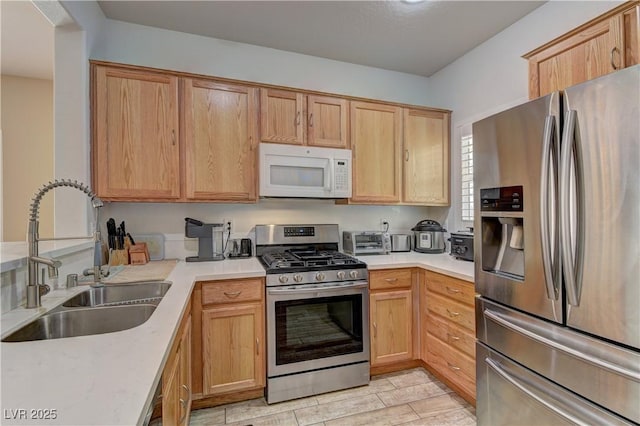 2304 Willow Wren Dr, North Las Vegas, NV 89084 - kitchen featuring appliances with stainless steel finishes and a sink