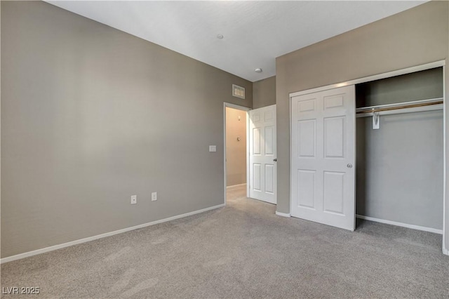 8486 Insignia Ave Unit 101, Las Vegas, NV 89178 - unfurnished bedroom with carpet, baseboards, and a closet