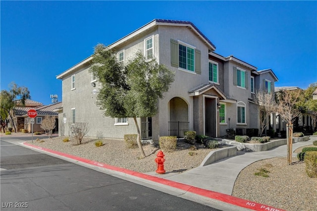 8486 Insignia Ave Unit 101, Las Vegas, NV 89178 - view of front of house featuring stucco siding
