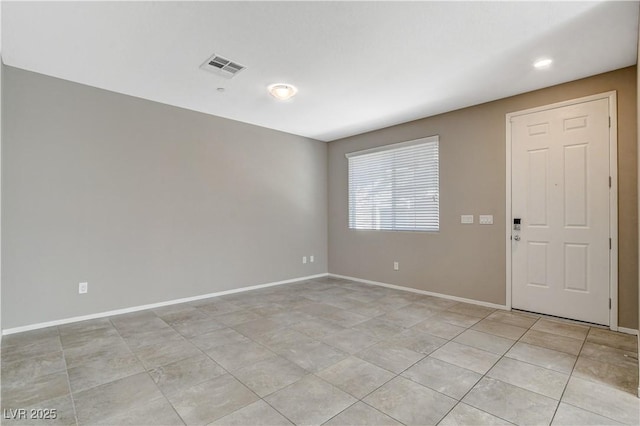 8486 Insignia Ave Unit 101, Las Vegas, NV 89178 - empty room with baseboards, light tile patterned floors, and recessed lighting