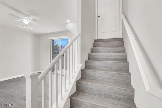 11856 Barona Mesa Ave, Las Vegas, NV 89138 - staircase featuring a ceiling fan and wood finished floors
