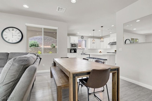 11856 Barona Mesa Ave, Las Vegas, NV 89138 - dining room with recessed lighting and light wood finished floors