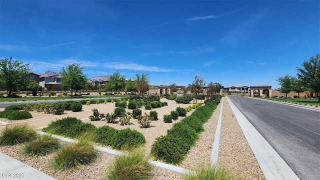 11856 Barona Mesa Ave, Las Vegas, NV 89138 - view of asphalt road featuring a residential view