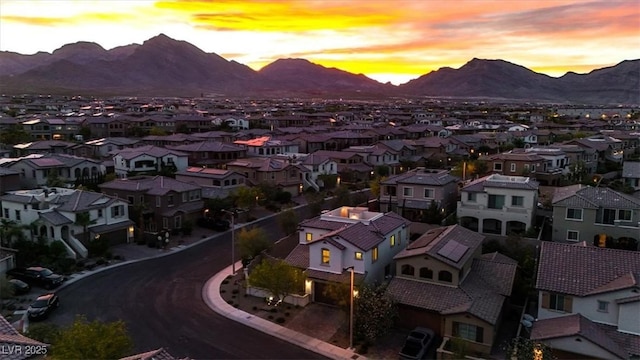 11856 Barona Mesa Ave, Las Vegas, NV 89138 - aerial view at dusk of a mountain view and a residential view
