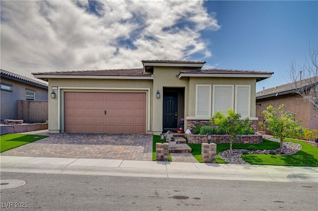 505 Sterling Falls Ave, Henderson, NV 89011 - prairie-style home with a garage, decorative driveway, stucco siding, and a tile roof