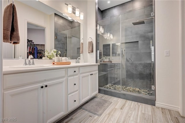 505 Sterling Falls Ave, Henderson, NV 89011 - full bath featuring double vanity, a shower stall, and a spacious closet
