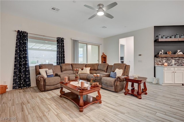 505 Sterling Falls Ave, Henderson, NV 89011 - living area with a ceiling fan and light wood-style flooring