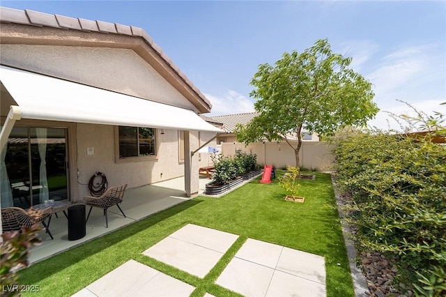 2021 Pelican Sky Beach Ave, North Las Vegas, NV 89081 - view of yard featuring a patio