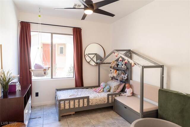2021 Pelican Sky Beach Ave, North Las Vegas, NV 89081 - bedroom featuring baseboards, a ceiling fan, and light tile patterned floors