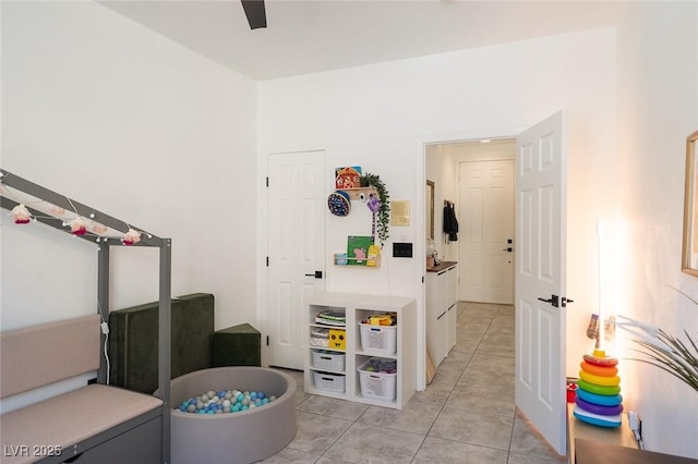 2021 Pelican Sky Beach Ave, North Las Vegas, NV 89081 - bedroom featuring light tile patterned flooring and ceiling fan