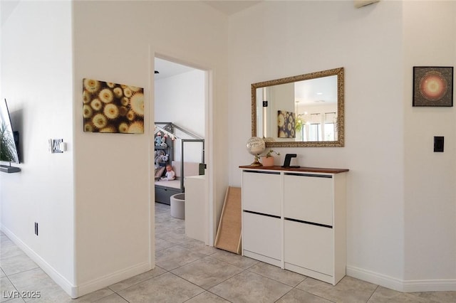 2021 Pelican Sky Beach Ave, North Las Vegas, NV 89081 - corridor with light tile patterned flooring and baseboards