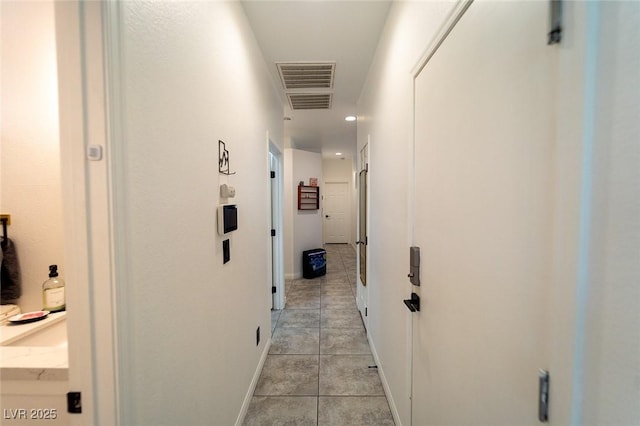 2021 Pelican Sky Beach Ave, North Las Vegas, NV 89081 - hall with light tile patterned floors