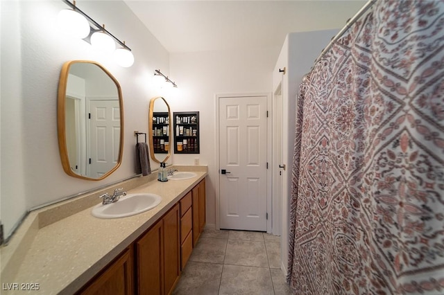 2021 Pelican Sky Beach Ave, North Las Vegas, NV 89081 - bathroom featuring double vanity and tile patterned floors