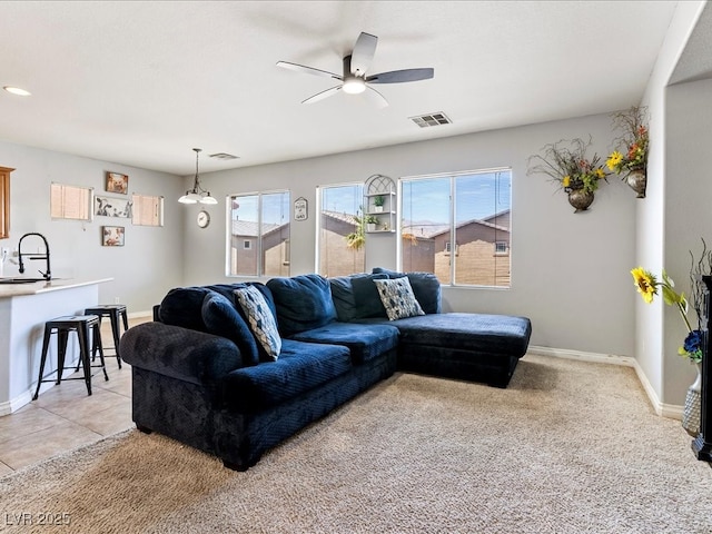 3040 Balcones Fault Ave, North Las Vegas, NV 89081 - living room featuring ceiling fan and baseboards