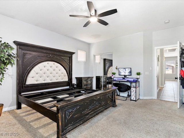 3040 Balcones Fault Ave, North Las Vegas, NV 89081 - carpeted living room with a ceiling fan, baseboards, and healthy amount of natural light