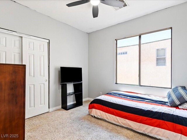 3040 Balcones Fault Ave, North Las Vegas, NV 89081 - bedroom with carpet floors, baseboards, and a ceiling fan