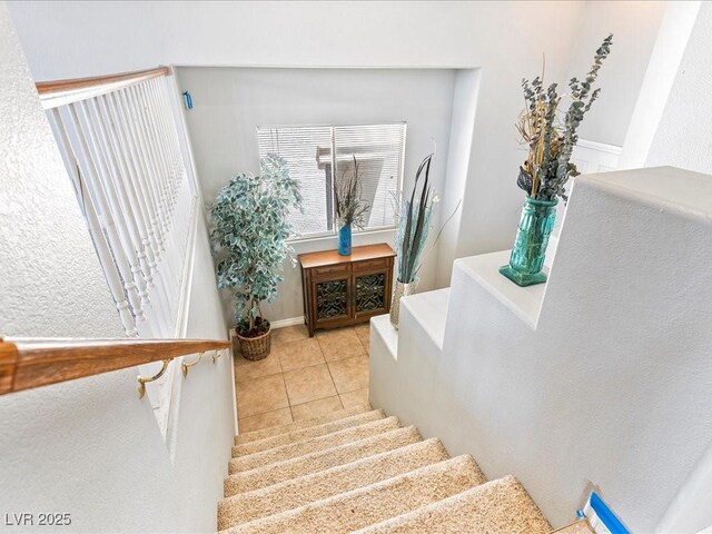3040 Balcones Fault Ave, North Las Vegas, NV 89081 - stairway featuring tile patterned floors and baseboards