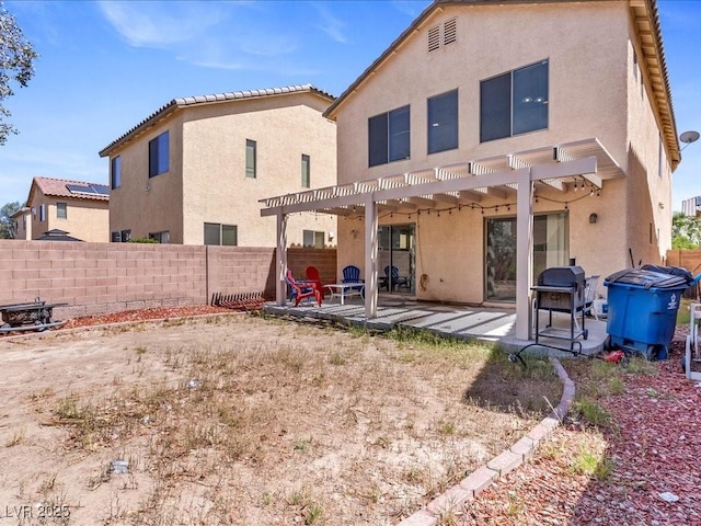 3040 Balcones Fault Ave, North Las Vegas, NV 89081 - rear view of house with stucco siding, a pergola, and a patio
