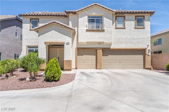 11134 Casala Ct, Las Vegas, NV 89141 - view of front of home with concrete driveway, an attached garage, stucco siding, a balcony, and a tile roof