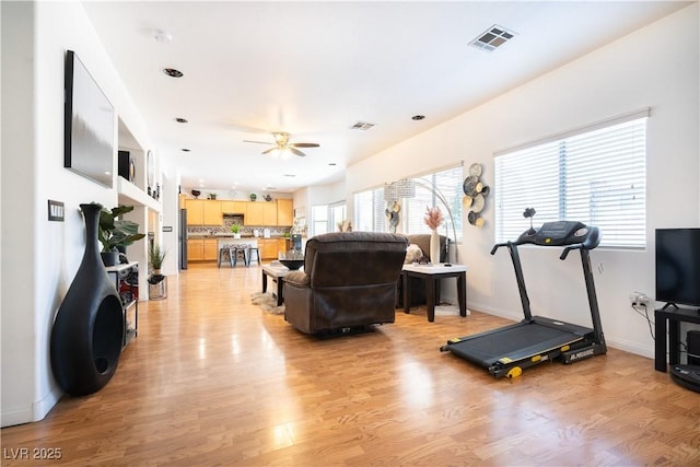 11134 Casala Ct, Las Vegas, NV 89141 - living area with light wood-style floors, a ceiling fan, and baseboards