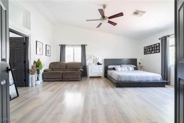 11134 Casala Ct, Las Vegas, NV 89141 - bedroom with lofted ceiling, light wood-style flooring, and a ceiling fan