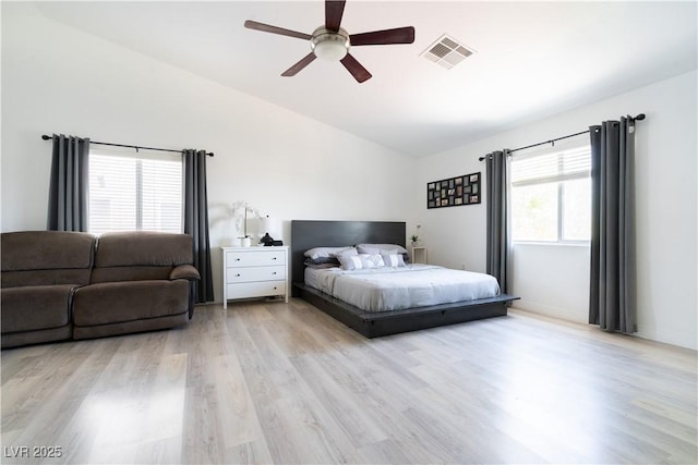 11134 Casala Ct, Las Vegas, NV 89141 - bedroom with lofted ceiling, light wood-type flooring, and a ceiling fan