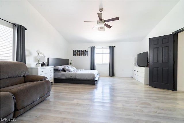 11134 Casala Ct, Las Vegas, NV 89141 - bedroom featuring vaulted ceiling, light wood-style flooring, and ceiling fan