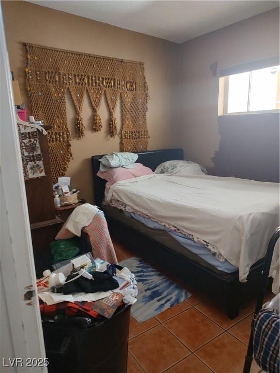 4727 Conrad St, Las Vegas, NV 89121 - bedroom with tile patterned floors
