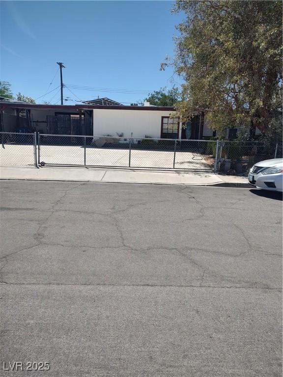 4727 Conrad St, Las Vegas, NV 89121 - view of front of home with a fenced front yard and a gate