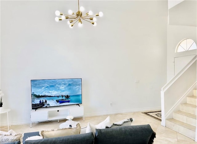 5984 Emerald Canyon Dr, Las Vegas, NV 89142 - living room with a chandelier, stairway, a towering ceiling, and baseboards