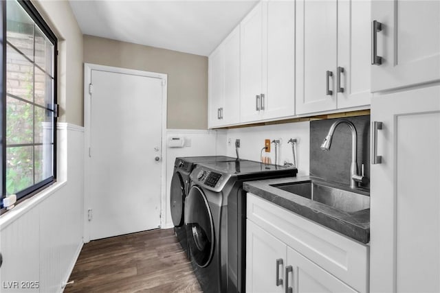 108 Quail Run Rd, Henderson, NV 89014 - washroom with separate washer and dryer, dark wood-style flooring, cabinet space, and wainscoting
