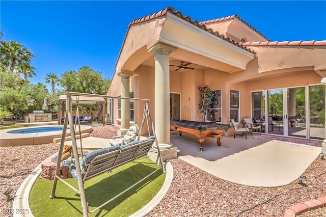27 Via Paradiso St, Henderson, NV 89011 - view of patio / terrace with a ceiling fan and an outdoor pool