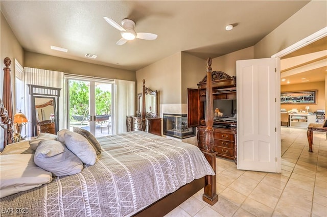 27 Via Paradiso St, Henderson, NV 89011 - bedroom with access to outside, light tile patterned floors, and a ceiling fan