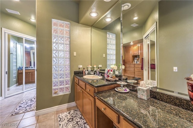 27 Via Paradiso St, Henderson, NV 89011 - bathroom featuring tile patterned flooring, vanity, baseboards, and recessed lighting