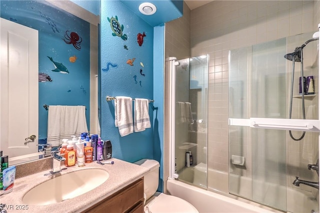 27 Via Paradiso St, Henderson, NV 89011 - full bathroom with vanity, bath / shower combo with glass door, and toilet
