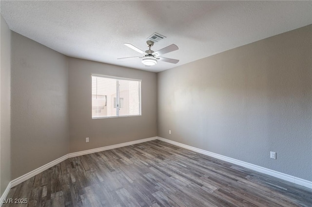 6873 Tamarus St Unit 201, Las Vegas, NV 89119 - unfurnished room featuring wood finished floors, a ceiling fan, baseboards, and a textured ceiling